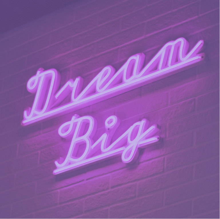 Startup dream big in neon pink lettering 
