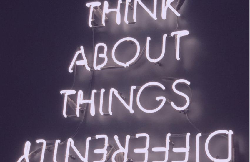 education think about things differently in neon letters